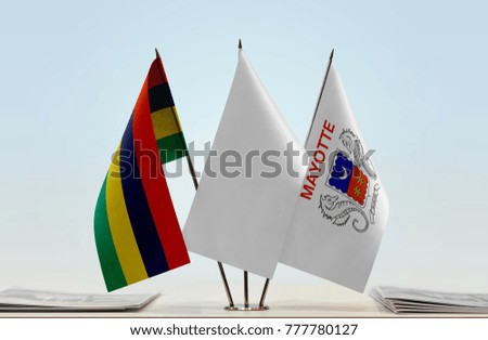 Flags of Mauritius and Mayotte with a white flag in the middle