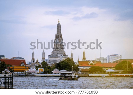 Wat Arun is a landmark and a tourist attraction of Thailand. And the Chao Phraya River