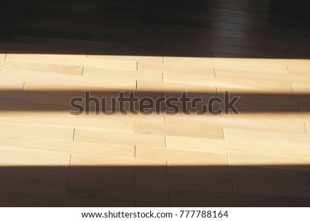 oak parquet lit with sunlight