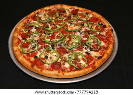 Pizza comes with many choices for toppings. Royalty-Free Stock Photo #777794218