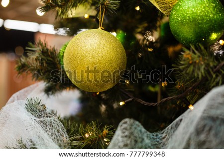 New Year decor with a Christmas tree with balls