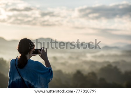 Take pictures of the mountains and sunrise on the new day.