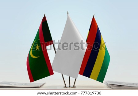 Flags of Mauritania and Mauritius with a white flag in the middle