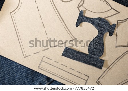 Pattern of clothing on fabric. Pattern of clothing made of paper, idea