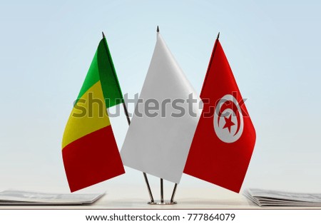 Flags of Mali and Tunisia with a white flag in the middle