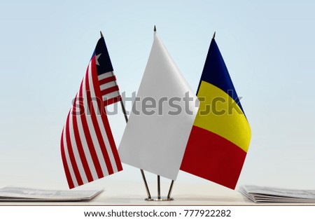 Flags of Liberia and Chad with a white flag in the middle
