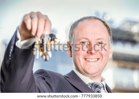 Bunch of keys in hand of elegant man