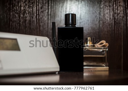 Perfume mockup on wood background