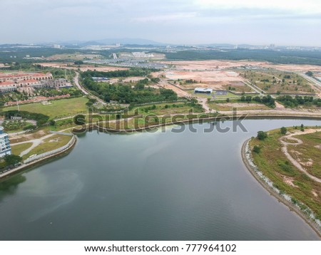 Aerial view of Puteri Harbour in Johore. Puteri Harbour was designed to bring world-class waterfront living and modern tourism. It is attached with a luxury hotel and shopping area.
