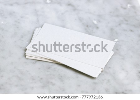 Blank business card on marble table