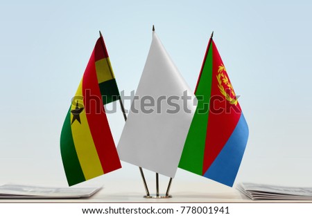 Flags of Ghana and Eritrea with a white flag in the middle