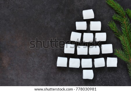 Abstract Christmas tree from marshmallow. New Year's background.