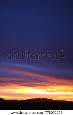 burning sky evening red heavy clouds chemical purple sky