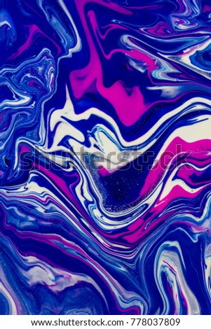 Colored marble mixed ink abstraction. Free style and handmade background and wallpaper.