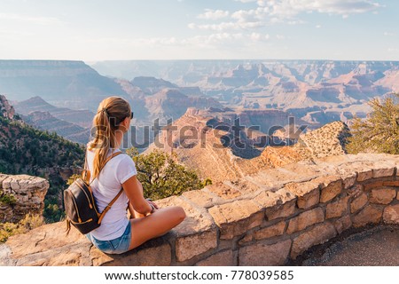 Beautiful girl exploring Grand Canyon national park in Arizona, USA. Royalty-Free Stock Photo #778039585