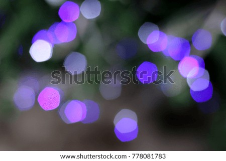 Diffused light or blur picture of Christmas tree with blue lighting bokeh background for happy new year party