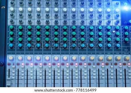 Mixer.Sound mixer controller in the control room.Sound mixer control for live music and studio equipment.This is a quality audio system for professionals.
