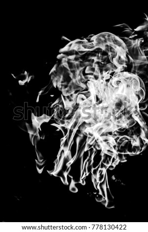 white smoke on a black background, abstraction
