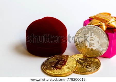 Coin bitcoin in a gift box for a ring or jewelry the concept of crypto currency the best gift