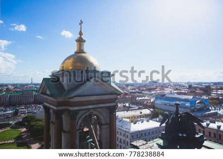 Beautiful super wide-angle summer aerial view of Saint-Petersburg, Russia with skyline and scenery beyond the city, seen from the observation deck of Saint Isaac's Cathedral.
