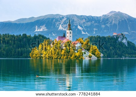 Sunrise view On Bled Lake, Island,Church And Castle With Mountain Range (Stol, Vrtaca, Begunjscica) In The Background-Bled, Slovenia, Europe Royalty-Free Stock Photo #778241884