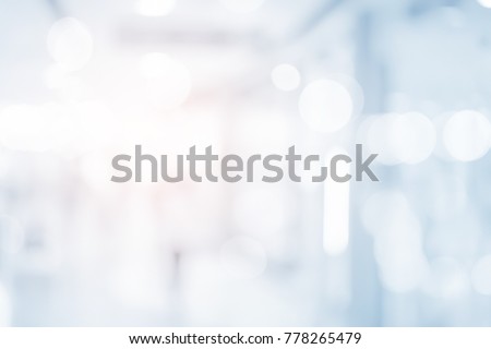 abstract blur contemporary office interior blue background with orange shine light effect concept