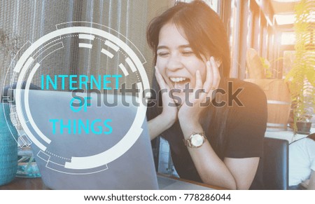 woman using laptop with IOT, internet of things conceptual sign, internet era, internet in every day lifes