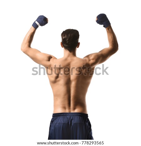 Attractive young boxer on white background