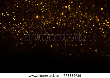 Unique abstract gold dust rain bokeh background