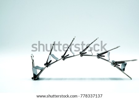 Black Paper clip isolated on white background.The shape.Has space for text.Has space for text.Suitable for many applications.Good image