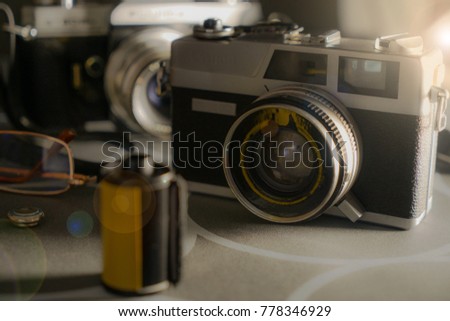  Camera / the camera is used in the film is cerrently used less because the digital camera replaced.                              