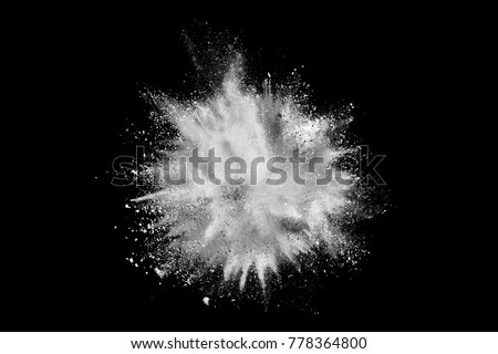 White powder explosion isolated on black background Royalty-Free Stock Photo #778364800