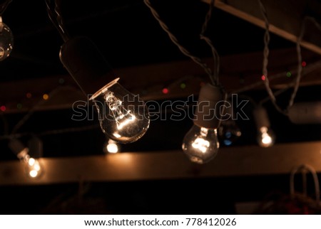 Beautiful retro luxury Old Many light bulbs hanging decor modern background Decorative antique edison style Close up picture filament  light  Vintage   home interior  design