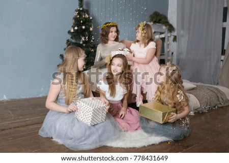 Group of children girls with presents on Christmas party