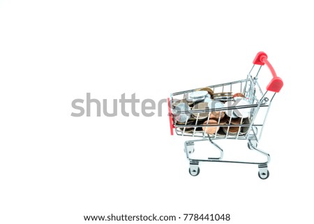 shopping cart with coins isolated on white background