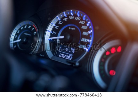 Closeup dashboard of mileage car Royalty-Free Stock Photo #778460413