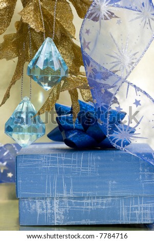blue gift box and silver celebration ribbon