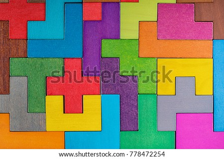 Abstract Background. Background with different colorful shapes wooden blocks . Geometric shapes in different colors. Concept of creative, logical thinking or problem solving. Royalty-Free Stock Photo #778472254