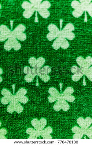 Macro closeup of St Patrick's Day green clover fabric