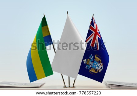 Flags of Gabon and Tristan da Cunha with a white flag in the middle