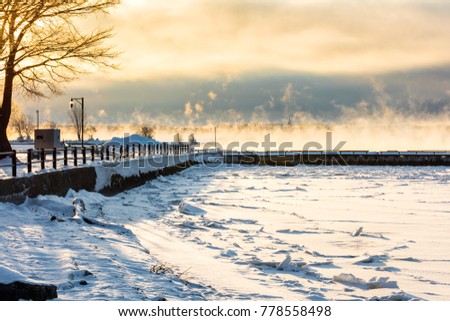 Lachine Lighthouse on a very cold December morning with steam coming of the lake in -14 Celsius conditions.