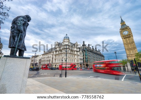 George street square with double decker buses in motion