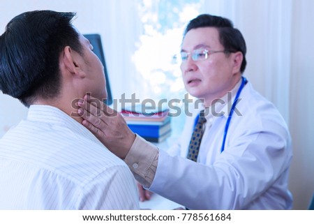 The doctor is diagnosing the patient.