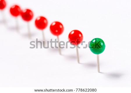 Row of pushpins. Business concept