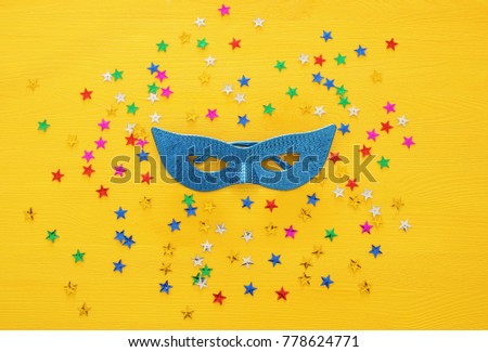 Top view image of masquerade venetian mask background. Flat lay. Purim celebration concept (jewish carnival holiday)