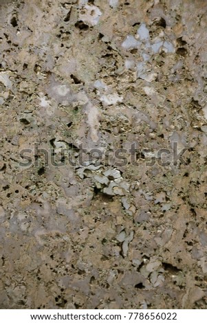 Texture of ancient stone wall. Granite, marble beautiful stone background pattern gray color modern style design decorative uneven cracks real surface of stone wall with cement. Deep crack background