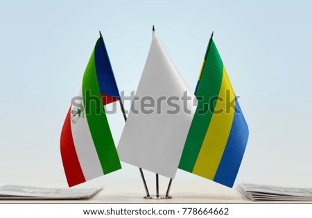 Flags of Equatorial Guinea and Gabon with a white flag in the middle