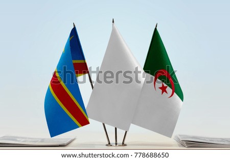 Flags of Democratic Republic of the Congo (DRC, DROC, Congo-Kinshasa) and Algeria with a white flag in the middle