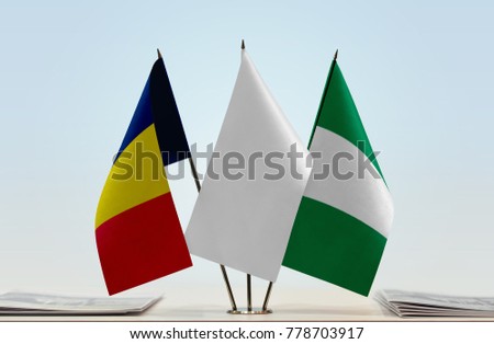 Flags of Chad and Nigeria with a white flag in the middle