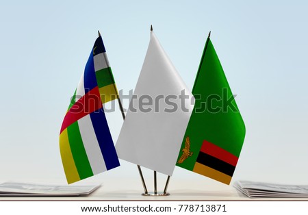 Flags of Central African Republic and Zambia with a white flag in the middle